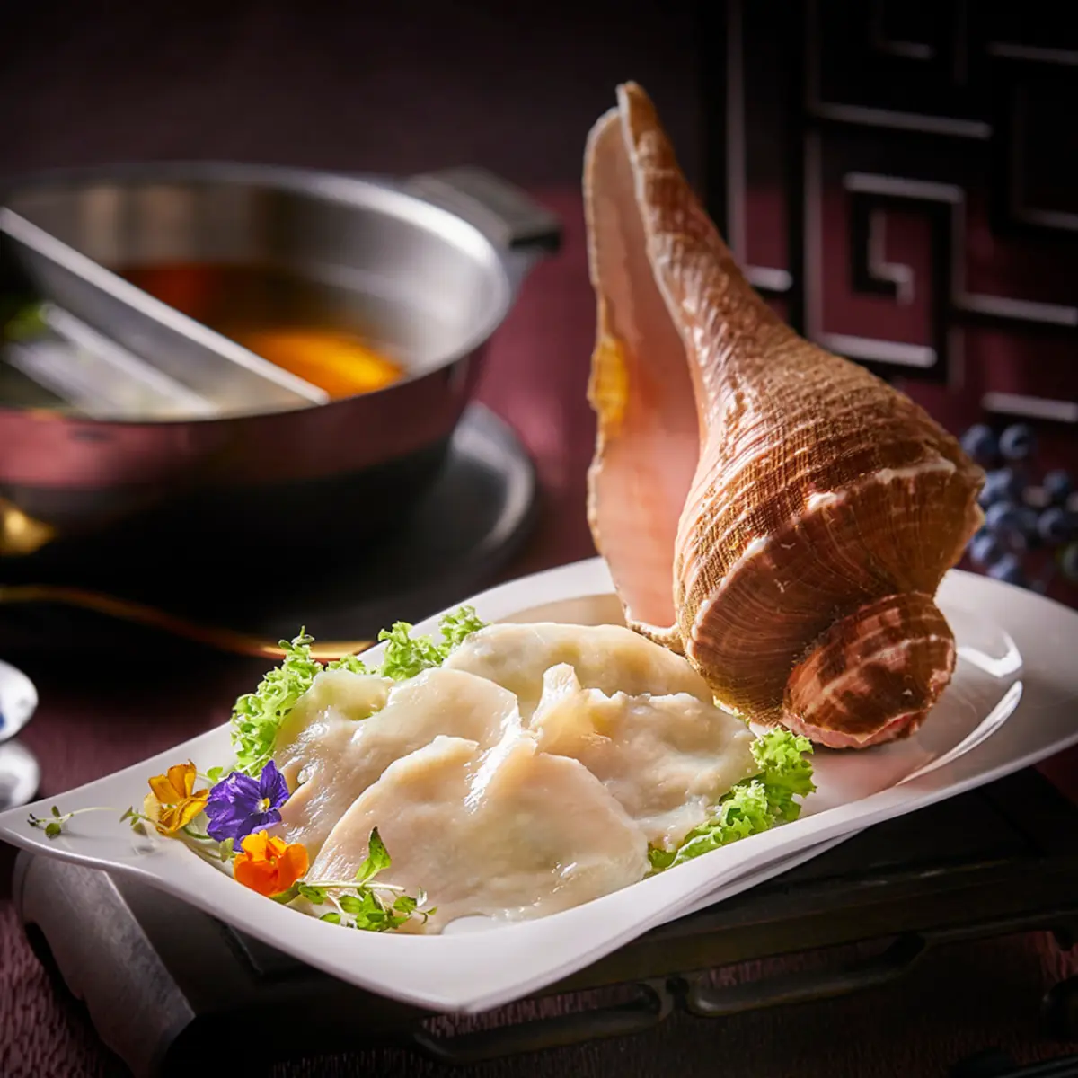 Poached sea whelk at Imperial Treasure Fine Teochew Cuisine, Singapore