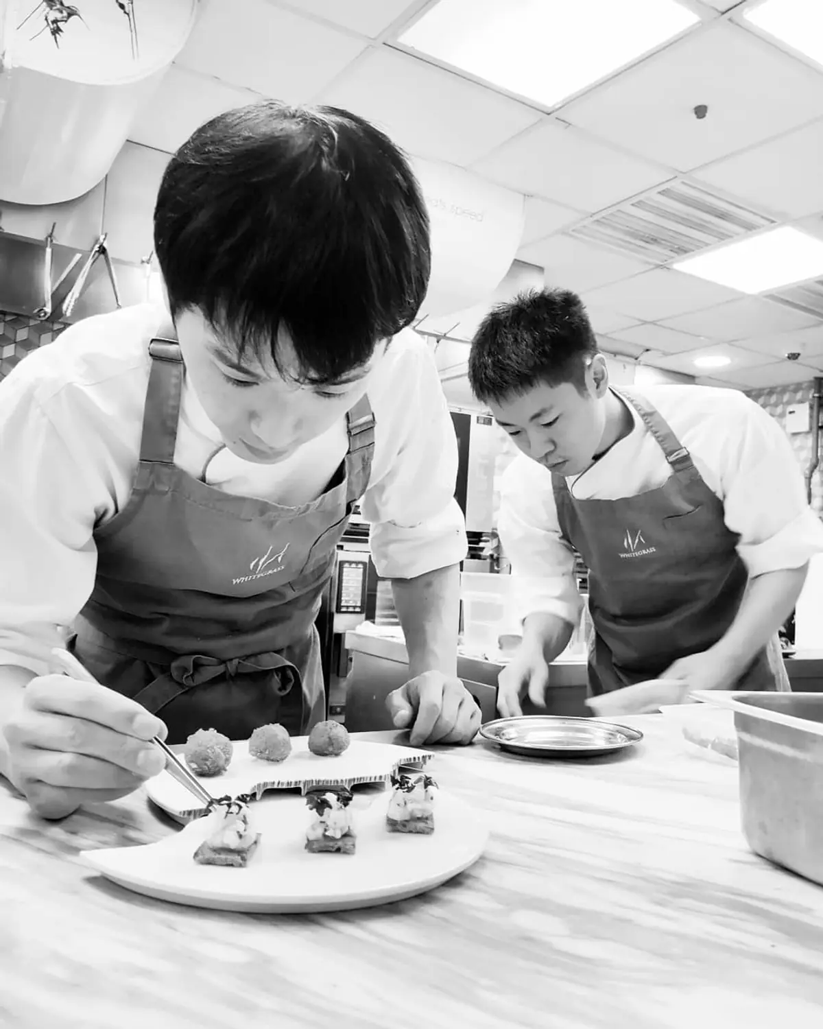 Chefs plating at Whitegrass, Singapore