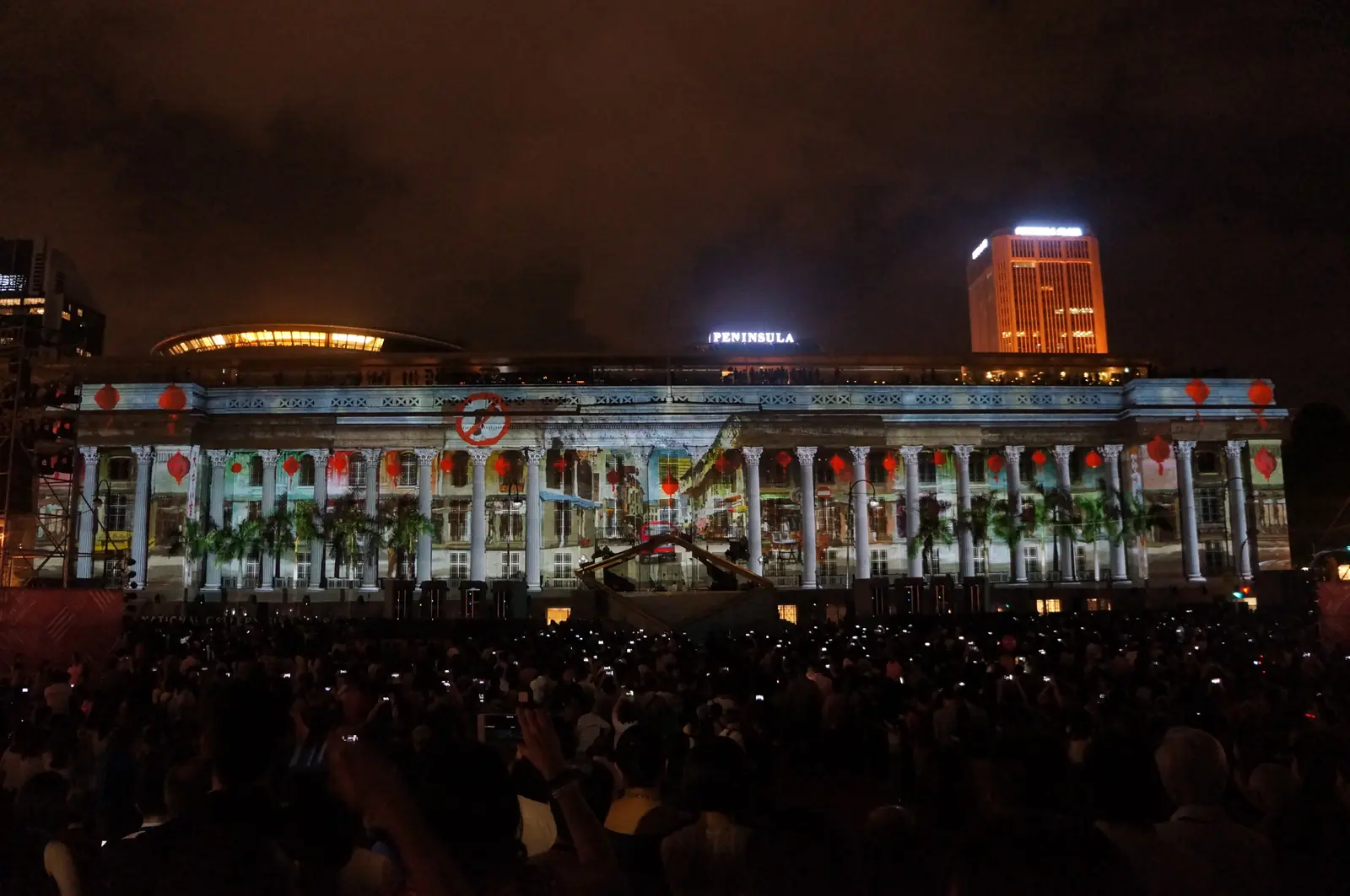National Gallery Singapore — Crowds gathered outside National Gallery Singapore watching the 'Share the Hope' facade light projection at night