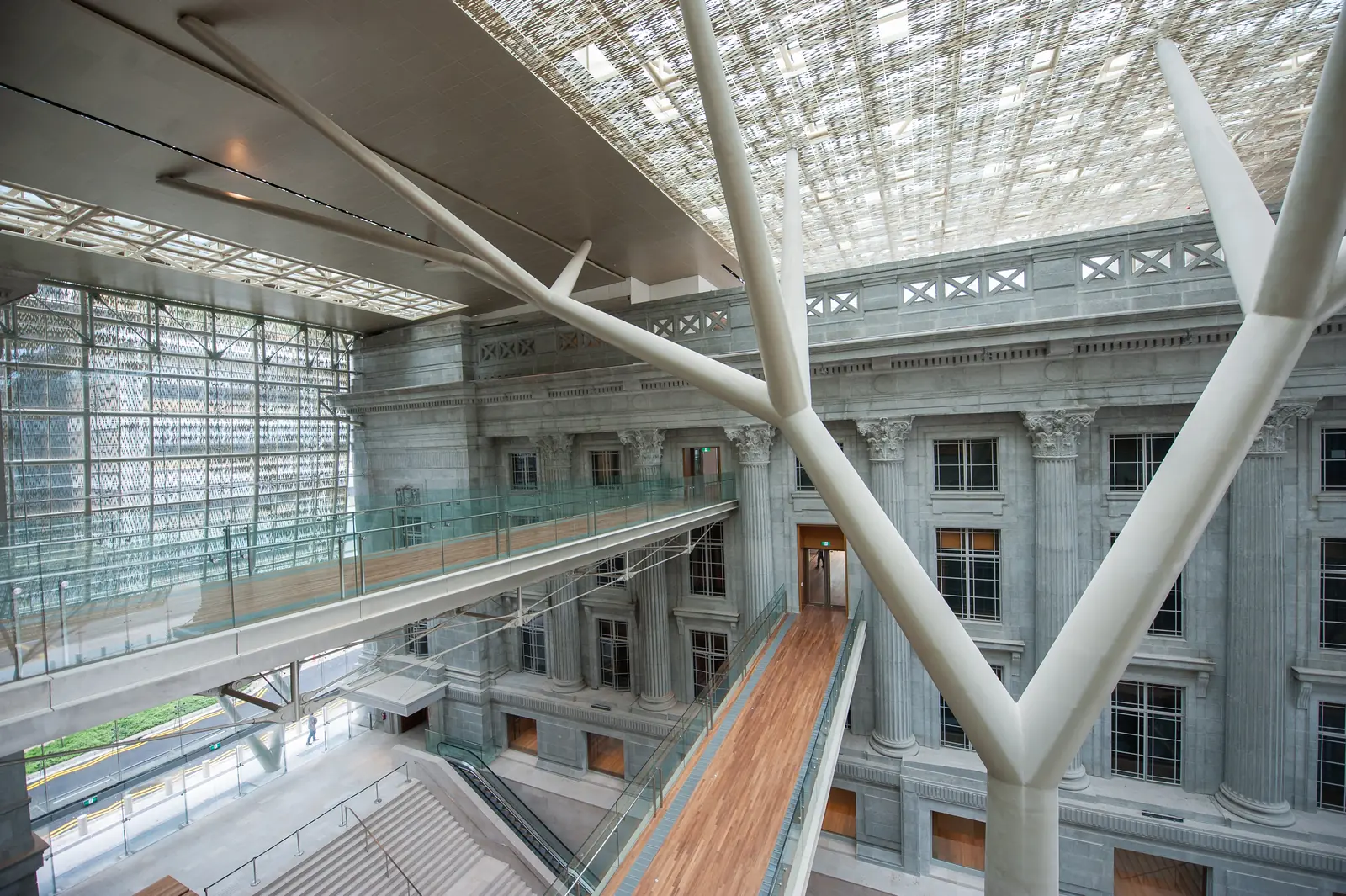 National Gallery Singapore — The naturally lit atrium of National Gallery Singapore beneath its latticed canopy roof